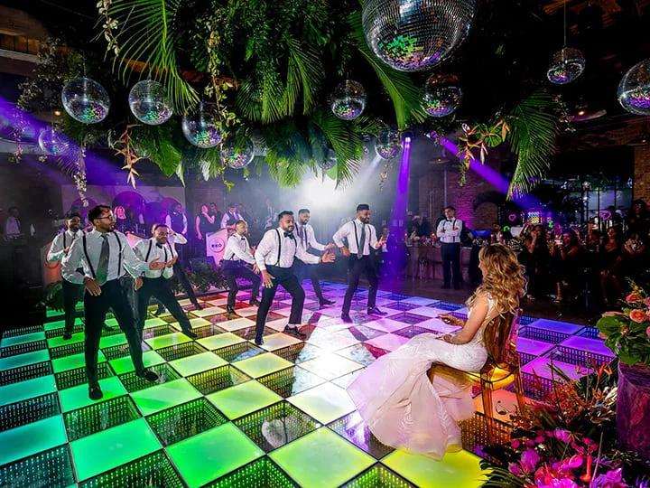 Hotel -Ballroom -Wedding -LED-Dance -Floors Crowd dancing on a waterproof 3D infinity mirror and rainbow LED dance floor in a nightclub venue.